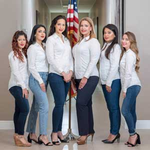 photo of attorney Sandra Echevarria and her professional staff